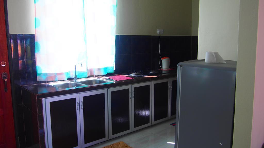 Tamteh Homestay Ayer Hitam Bagian luar foto